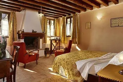 Letto o letti in una camera di Tenuta Le Risare