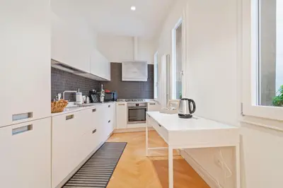 Cucina o angolo cottura di GuestHost - San Fermo Luxury Apartment