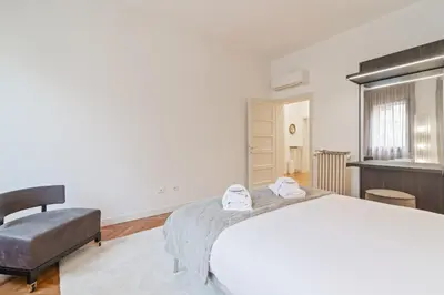 Letto o letti in una camera di GuestHost - San Fermo Luxury Apartment