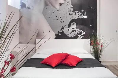 Letto o letti in una camera di San Polo Design Apartments by Wonderful Italy
