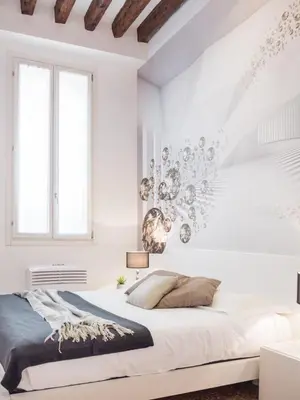 Letto o letti in una camera di San Polo Design Apartments by Wonderful Italy