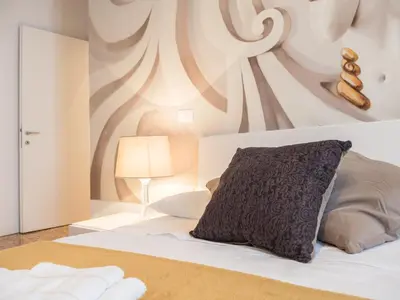 Letto o letti in una camera di San Polo Design Apartments by Wonderful Italy