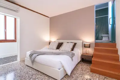 Letto o letti in una camera di Casanova Deluxe Apartment by Wonderful Italy