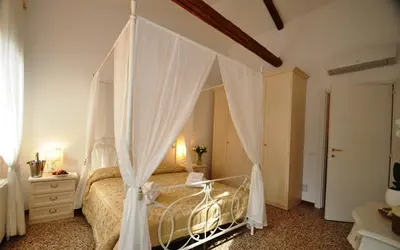 Letto o letti in una camera di Ca' Alansari