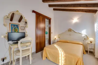 Letto o letti in una camera di Hotel Bernardi Semenzato