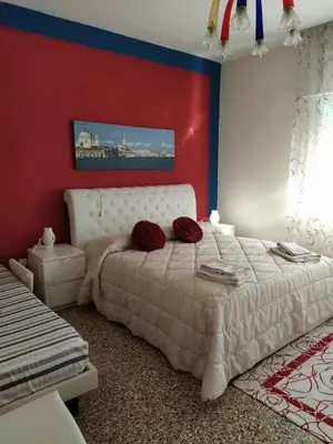 Letto o letti in una camera di Holiday With Children In Venice