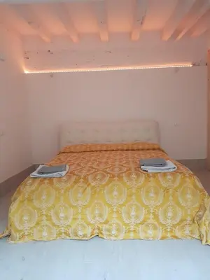 Letto o letti in una camera di golden place