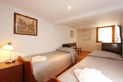 Letto o letti in una camera di Residence dei Mori