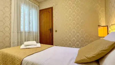 Letto o letti in una camera di Residence San Marco MCS