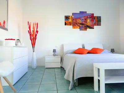 Letto o letti in una camera di Villa Marina