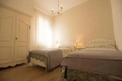 Letto o letti in una camera di Grimaldi Apartments Ca Del Moro