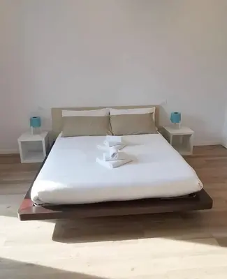 Letto o letti in una camera di Civico21