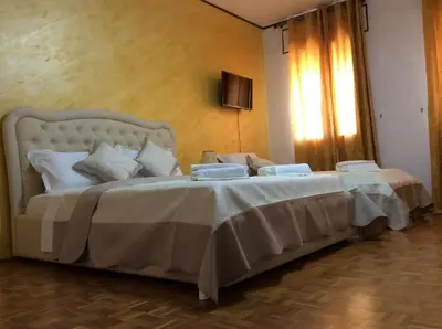 Letto o letti in una camera di C'a Stazione Venezia Mestre