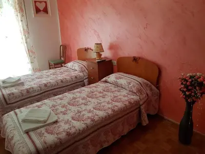 Letto o letti in una camera di C'a Stazione Venezia Mestre
