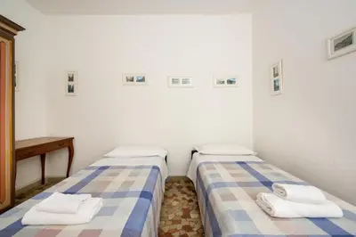 Letto o letti in una camera di Kyra's House by Sarlux