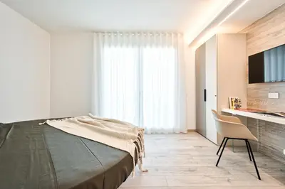 Letto o letti in una camera di Albamarina Residence