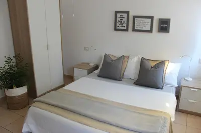 Letto o letti in una camera di Casa Vacanze Giorgetta 3 piano