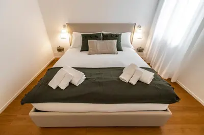 Letto o letti in una camera di Ca' Delle Acque Deluxe Apartment R&R