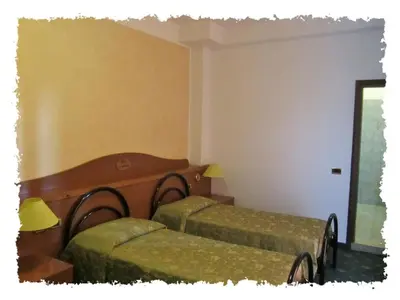 Letto o letti in una camera di Hotel Green castellani