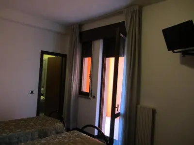 Letto o letti in una camera di Hotel Green castellani