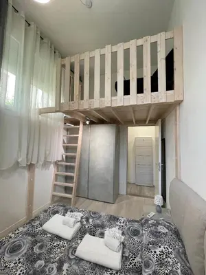 Letto o letti in una camera di Da Lenny the Grey Apartment