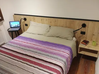 Letto o letti in una camera di B&B Mirò