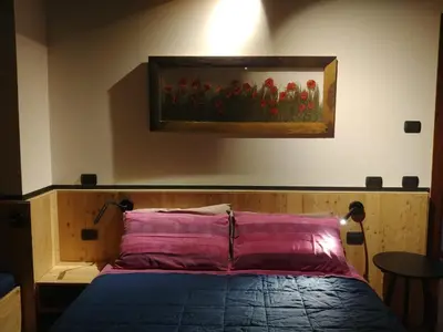 Letto o letti in una camera di B&B Mirò