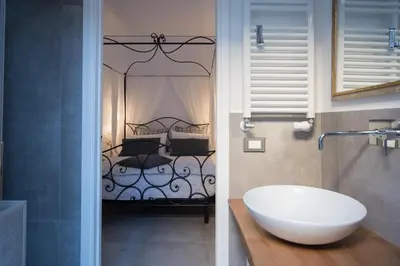Letto o letti in una camera di Biennale Apartments Venice