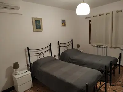 Letto o letti in una camera di Guizzo apartment Venezia
