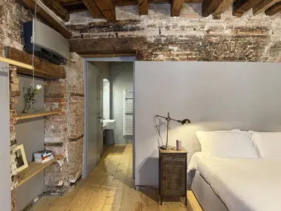 Letto o letti in una camera di Palazzetto San Marco