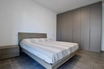 Letto o letti in una camera di Cala Blu - Home Immobiliare Jesolo