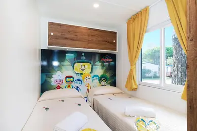 Letto o letti in una camera di Club del Sole Jesolo Family Resort