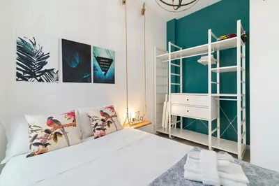Letto o letti in una camera di GuestHost - Garden Mini Flat Specola