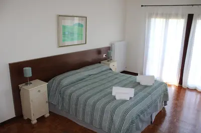 Letto o letti in una camera di Villa Flangini