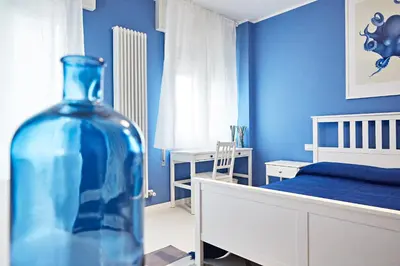 Letto o letti in una camera di Riviera Marco Polo