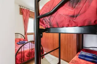 Letto o letti in una camera di Appartamento da Simone a Rosolina Mare