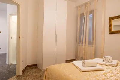 Letto o letti in una camera di The Heart of San Marco - WiFi