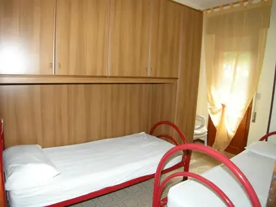 Letto o letti in una camera di Villa Milviana appartamento