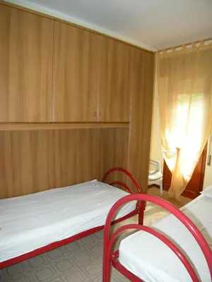 Letto o letti in una camera di Villa Milviana appartamento