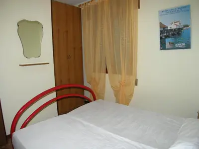 Letto o letti in una camera di Villa Milviana appartamento