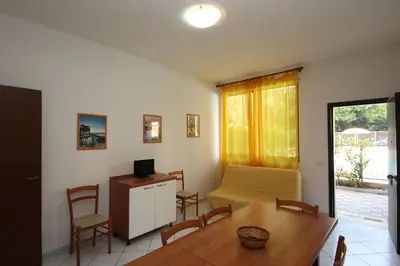 TV o dispositivi per l'intrattenimento presso Acquasmeralda appartamento 03