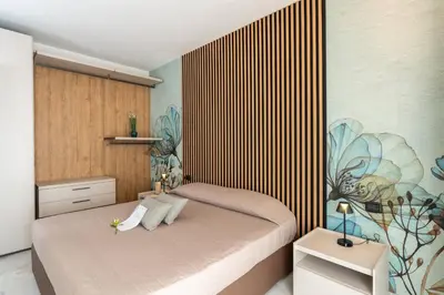 Letto o letti in una camera di Bilocale di Design SP12, Condominio San Paolo - 3' Piano - Adria Holiday Jesolo
