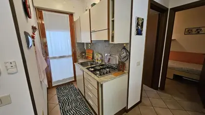 Cucina o angolo cottura di Villaggio Tirreno appartamento 02