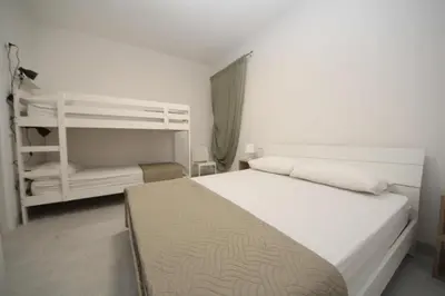 Letto o letti in una camera di Villa Antonio appartamento 02