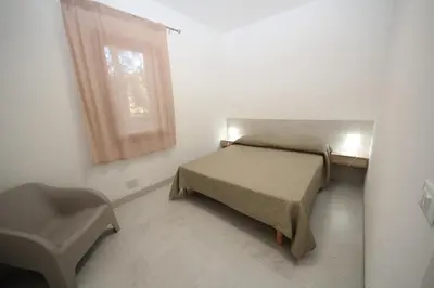 Letto o letti in una camera di Villa Antonio appartamento 03