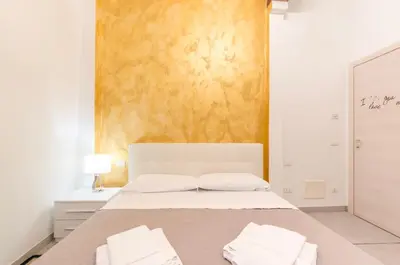 Letto o letti in una camera di ANDREA Venice FLAT Mezzanine Floor