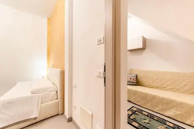 Letto o letti in una camera di ANDREA Venice FLAT Mezzanine Floor