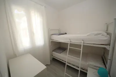 Letto o letti in una camera di Villa Manu appartamento 01
