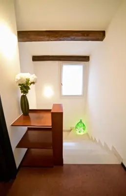 Letto o letti in una camera di Casa Mosaico
