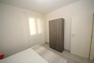 Letto o letti in una camera di Villa Manu appartamento 02